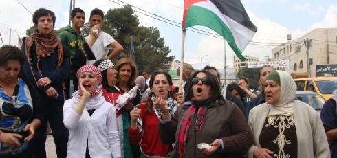 Palestinian women protest at Qalandia (photo: Mya Guarnieri)